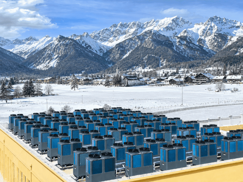 AirProz commercial heat pump district heating system deployed across a rural village community in Bratislava region, Slovakia, replacing traditional gas boiler infrastructure