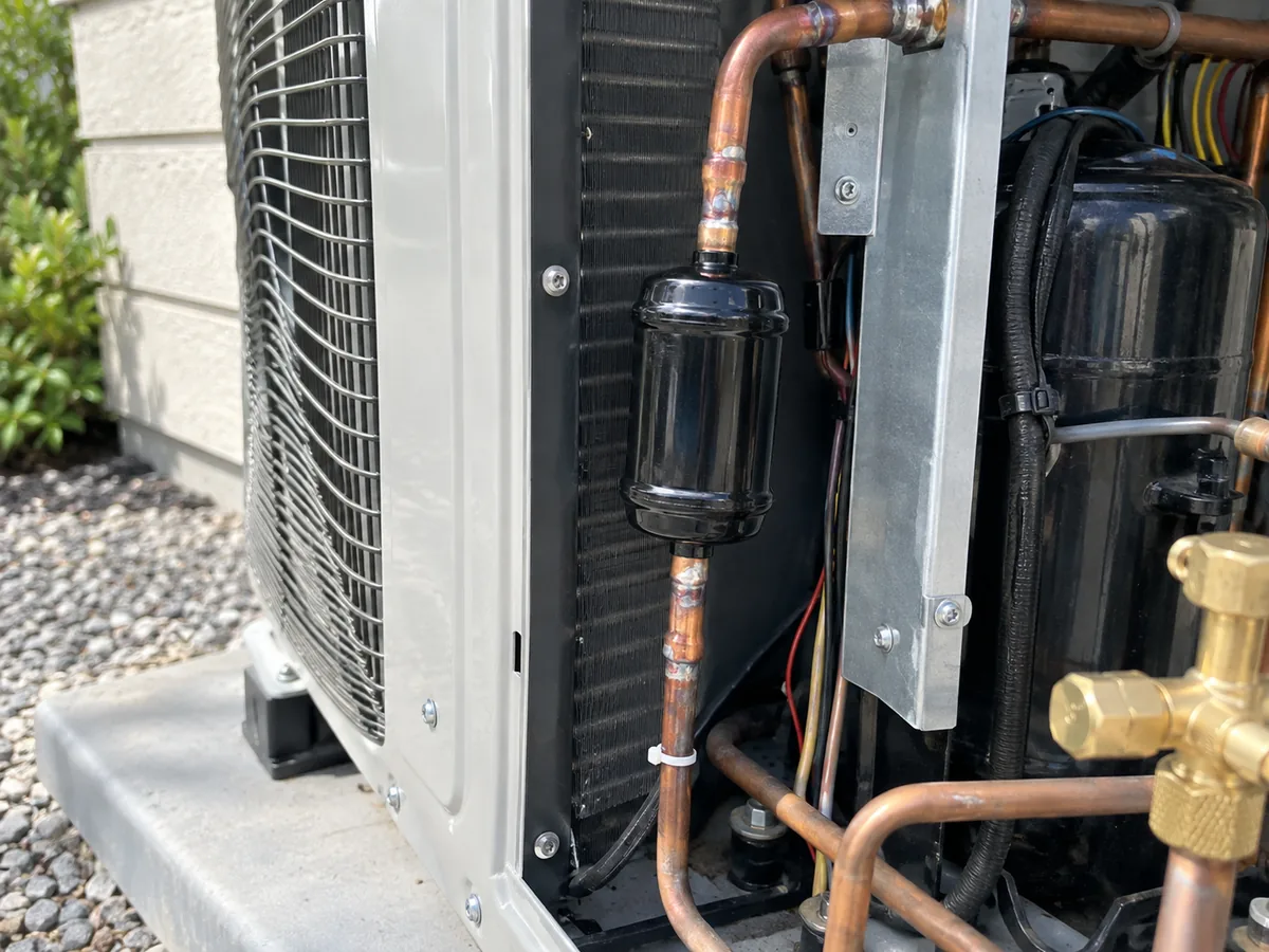 Filter drier installed in the refrigerant line of an outdoor air-conditioning system.